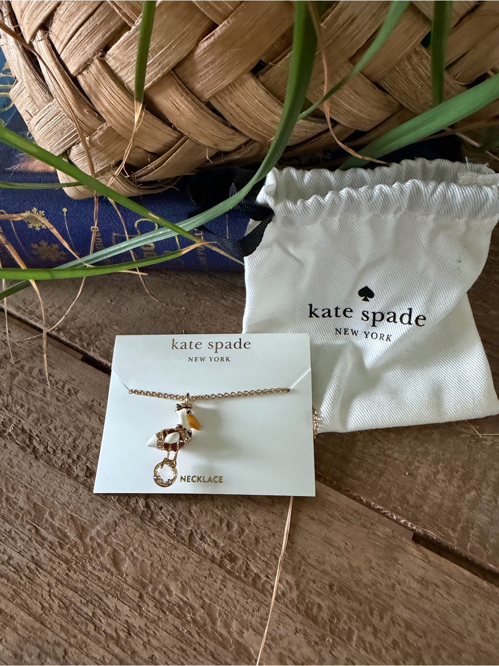 kate spade New York Gold and White Pelican Pendant Necklace